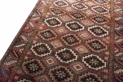 Backside of handmade 2000s Hamedan rug showing knot structure and weave density