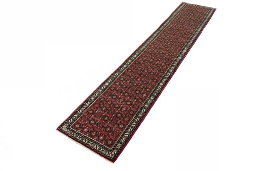 Corner detail of New Hamedan rug showing border pattern and Wool pile