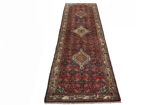 Surface texture of 2000s Hamedan rug with natural Wool and intricate pattern