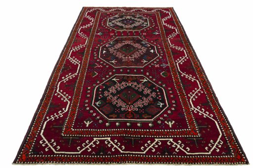 Surface texture of 2000s Hamedan rug with natural Wool and intricate pattern