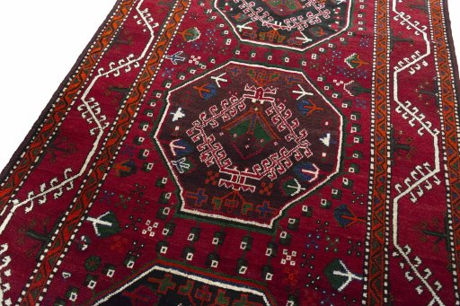 Backside of handmade 2000s Hamedan rug showing knot structure and weave density