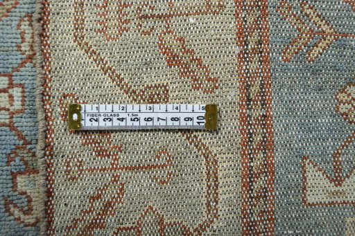 Backside of handmade 1950s Hamedan rug showing knot structure and weave density