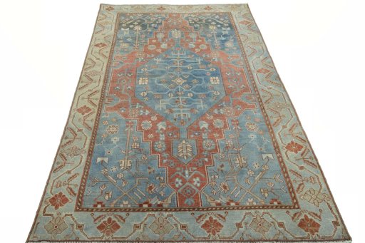 Surface texture of 1950s Hamedan rug with natural Wool and intricate pattern
