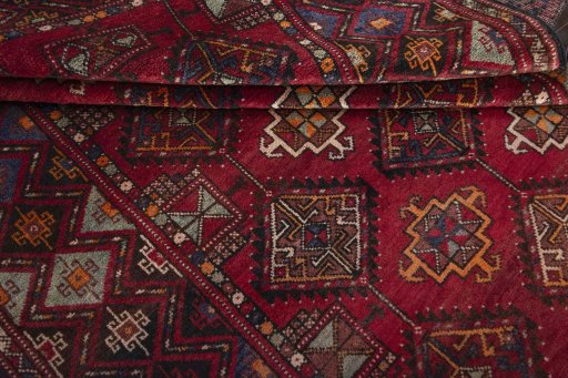 Full view of 1970s Hamedan rug from Iran / Persia, 309 × 154 cm in Red tones