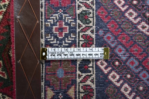 Close-up detail of 2000s Hamedan rug from Iran / Persia showing Wool weave