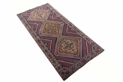 Close-up detail of 2000s Hamedan rug from Iran / Persia showing Wool weave