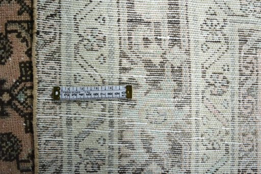 Close-up detail of 1970s Hamedan rug from Iran / Persia showing Wool weave