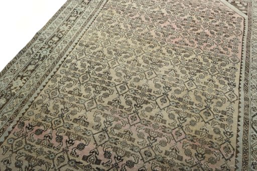 Backside of handmade 1970s Hamedan rug showing knot structure and weave density