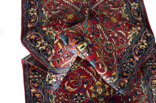 Corner detail of New Hamedan rug showing border pattern and Wool pile