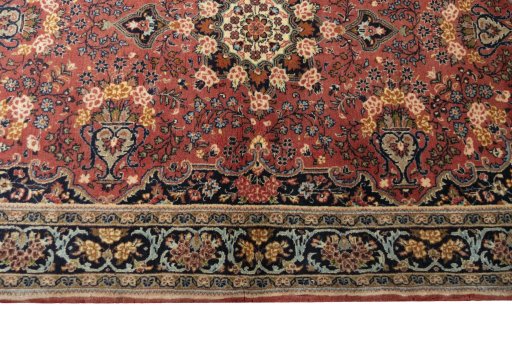 Corner detail of 2000s Hamedan rug showing border pattern and Wool pile