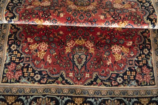 Close-up detail of 2000s Hamedan rug from Iran / Persia showing Wool weave