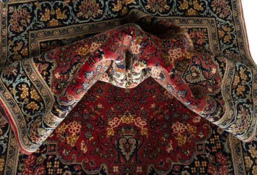 Surface texture of 2000s Hamedan rug with natural Wool and intricate pattern
