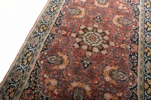 Backside of handmade 2000s Hamedan rug showing knot structure and weave density