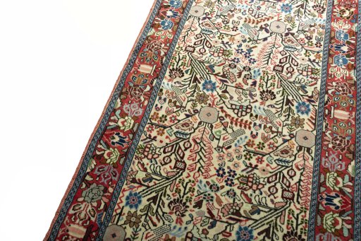 Backside of handmade New Hamedan rug showing knot structure and weave density