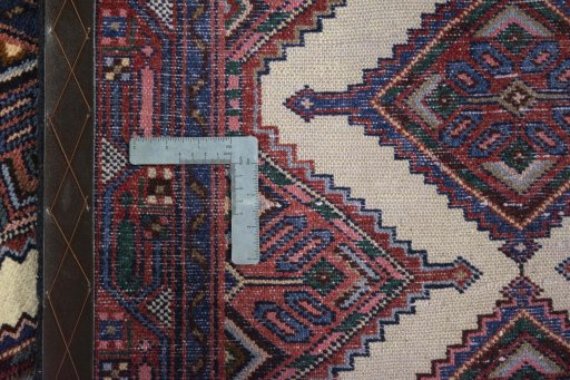 Close-up detail of New Hamedan rug from Iran / Persia showing Wool weave
