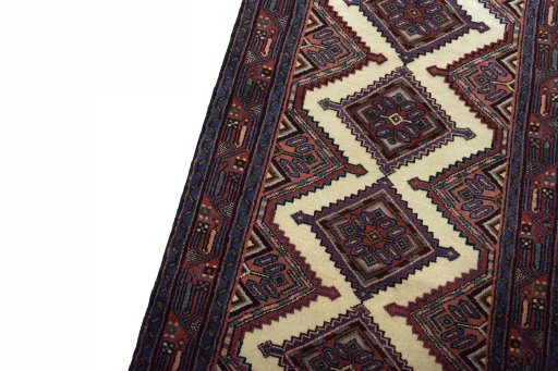 Backside of handmade New Hamedan rug showing knot structure and weave density
