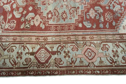 Corner detail of 1950s Hamedan rug showing border pattern and Wool pile