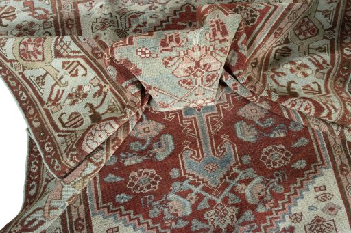 Surface texture of 1950s Hamedan rug with natural Wool and intricate pattern