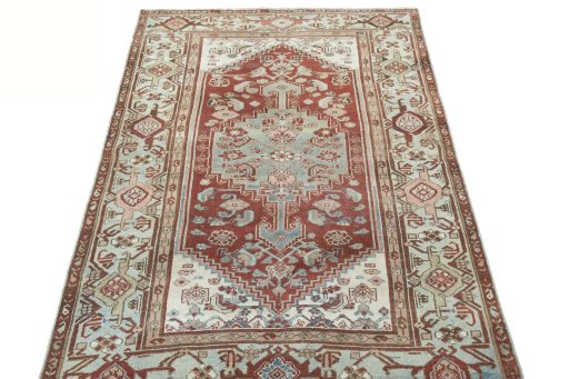Surface texture of 1950s Hamedan rug with natural Wool and intricate pattern