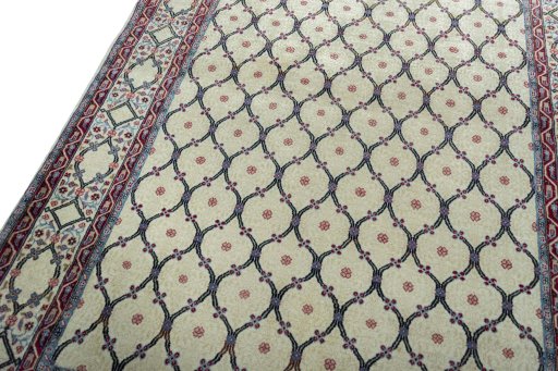 Backside of handmade 1970s Hamedan rug showing knot structure and weave density