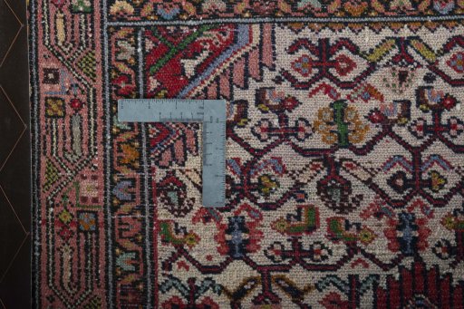 Close-up detail of 2000s Hamedan rug from Iran / Persia showing Wool weave