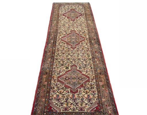 Surface texture of 2000s Hamedan rug with natural Wool and intricate pattern