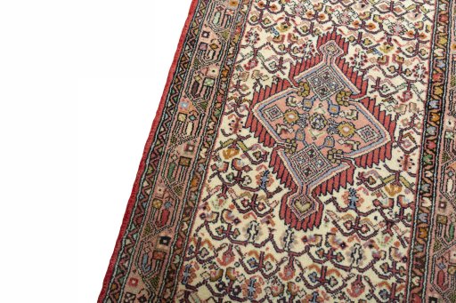 Backside of handmade 2000s Hamedan rug showing knot structure and weave density