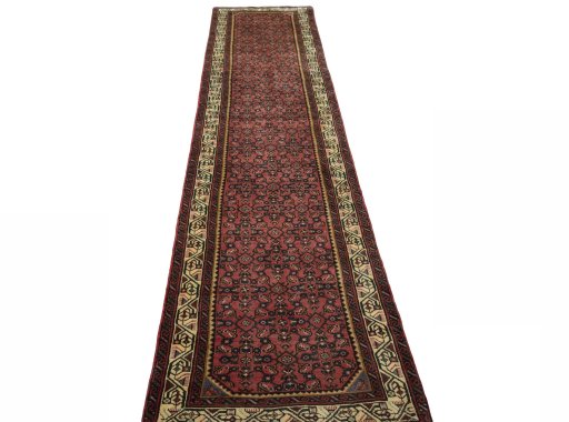 Surface texture of 2000s Hamedan rug with natural Wool and intricate pattern