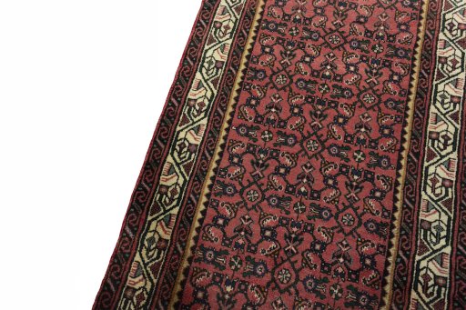 Backside of handmade 2000s Hamedan rug showing knot structure and weave density
