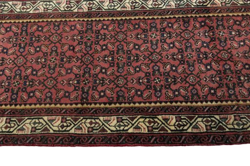 Close-up detail of 2000s Hamedan rug from Iran / Persia showing Wool weave