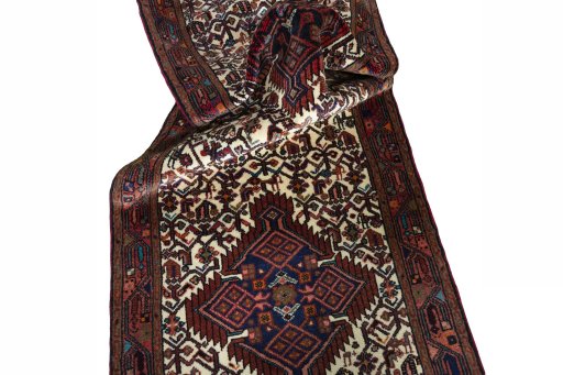 Close-up detail of 2000s Hamedan rug from Iran / Persia showing Wool weave