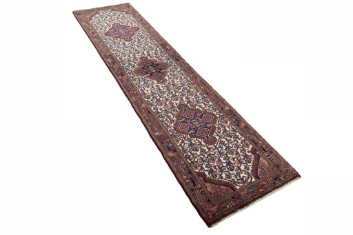 Close-up detail of 2000s Hamedan rug from Iran / Persia showing Wool weave