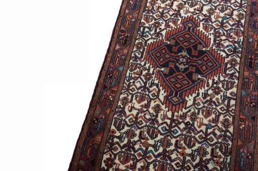 Backside of handmade 2000s Hamedan rug showing knot structure and weave density