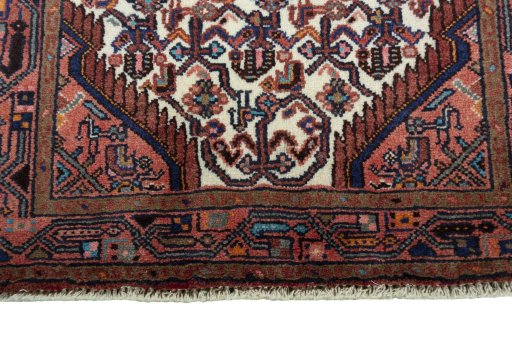 Close-up detail of 2000s Hamedan rug from Iran / Persia showing Wool weave
