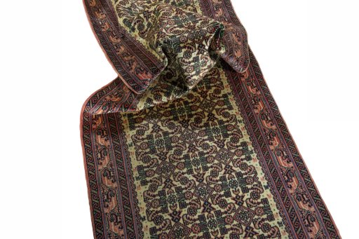 Corner detail of 2000s Hamedan rug showing border pattern and Wool pile