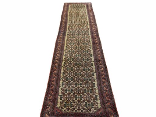 Surface texture of 2000s Hamedan rug with natural Wool and intricate pattern