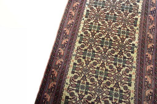 Backside of handmade 2000s Hamedan rug showing knot structure and weave density