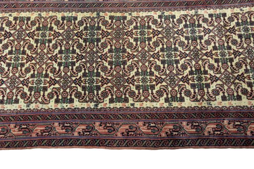 Close-up detail of 2000s Hamedan rug from Iran / Persia showing Wool weave