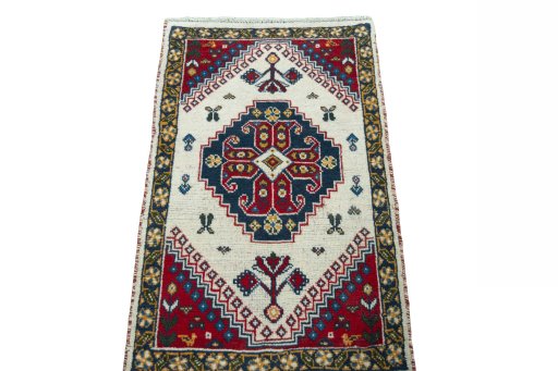 Surface texture of 2000s Hamedan rug with natural Wool and intricate pattern