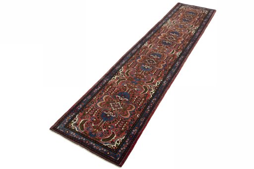 Corner detail of New Hamedan rug showing border pattern and Wool pile