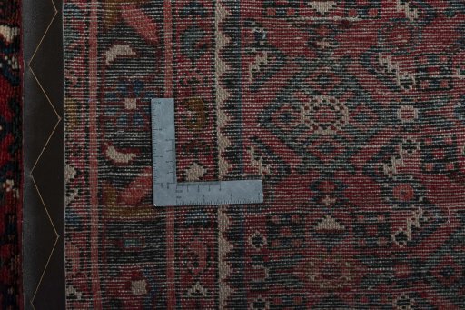 Close-up detail of 2000s Hamedan rug from Iran / Persia showing Wool weave