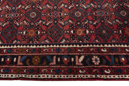 Close-up detail of 2000s Hamedan rug from Iran / Persia showing Wool weave