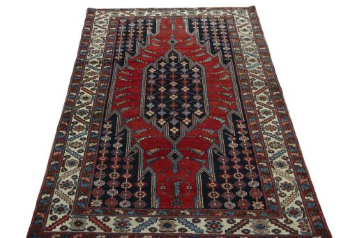 Surface texture of 1930s Hamedan rug with natural Wool and intricate pattern