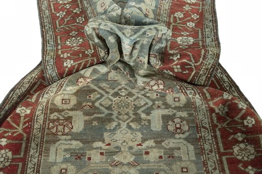 Corner detail of 1930s Hamedan rug showing border pattern and Wool pile
