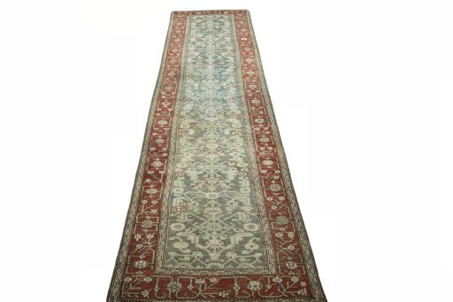 Surface texture of 1930s Hamedan rug with natural Wool and intricate pattern