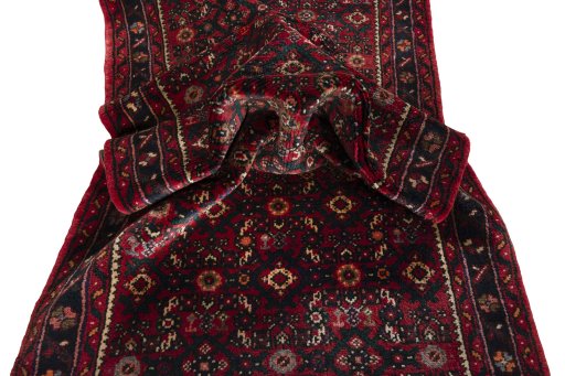 Corner detail of New Hamedan rug showing border pattern and Wool pile