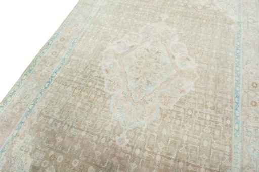 Backside of handmade 1950s Hamedan rug showing knot structure and weave density