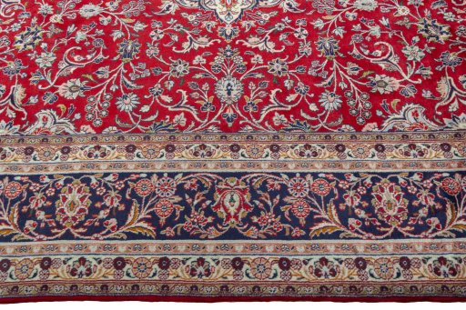 Corner detail of 2000s Hamedan rug showing border pattern and Wool pile