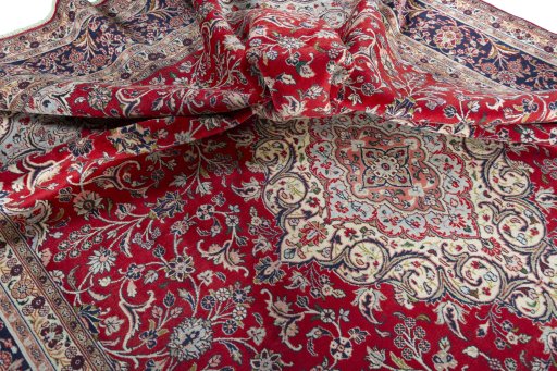 Surface texture of 2000s Hamedan rug with natural Wool and intricate pattern