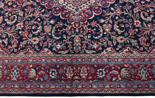 Corner detail of New Hamedan rug showing border pattern and Wool pile